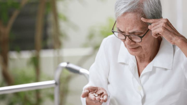 elderly woman thinking 