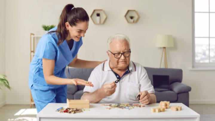 a nurse taking care an older man