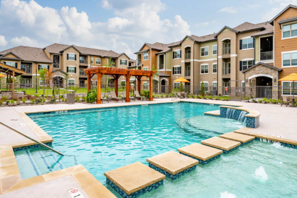 Resort Style Pool with Splash Pad in Cypress Creek at Hazelwood in Princeton, Texas