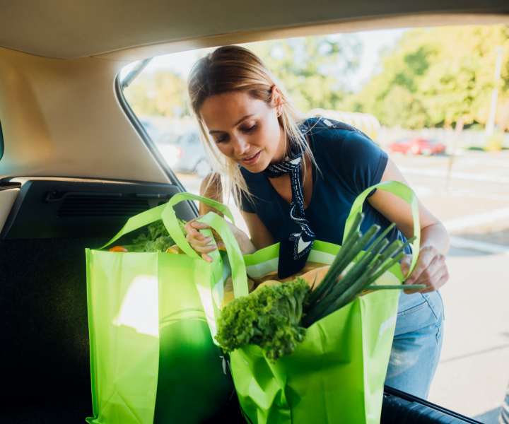 Resident unloading groceries at Yauger Park Villas in Olympia, Washington