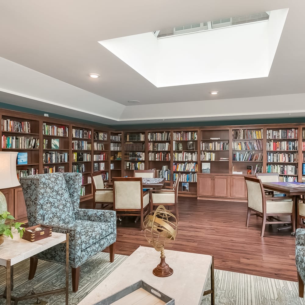Resident library at Applewood Pointe of Champlin at Mississippi Crossings in Champlin, Minnesota. 