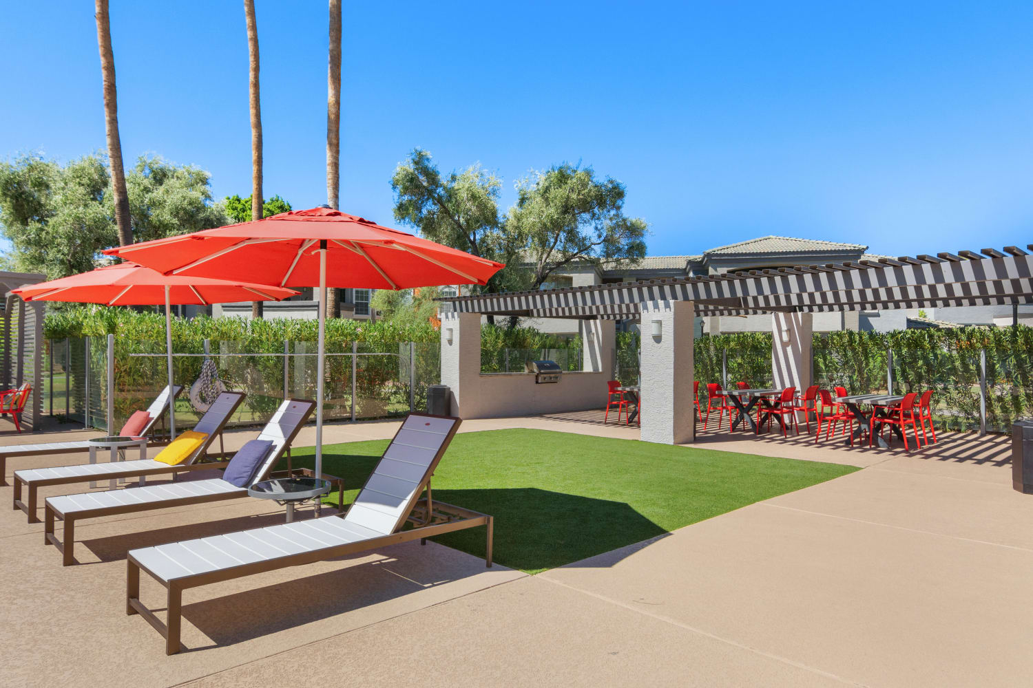 Outdoor patio and lawn games at Luxe @ Ocotillo in Chandler, Arizona
