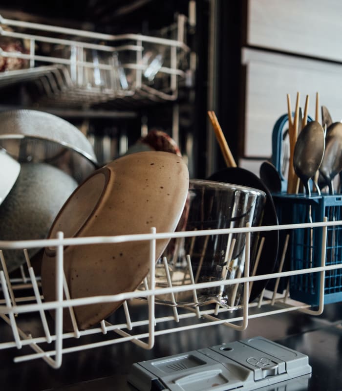 Dishes in the dishwasher at Cascata Apartments in Tulsa, Oklahoma