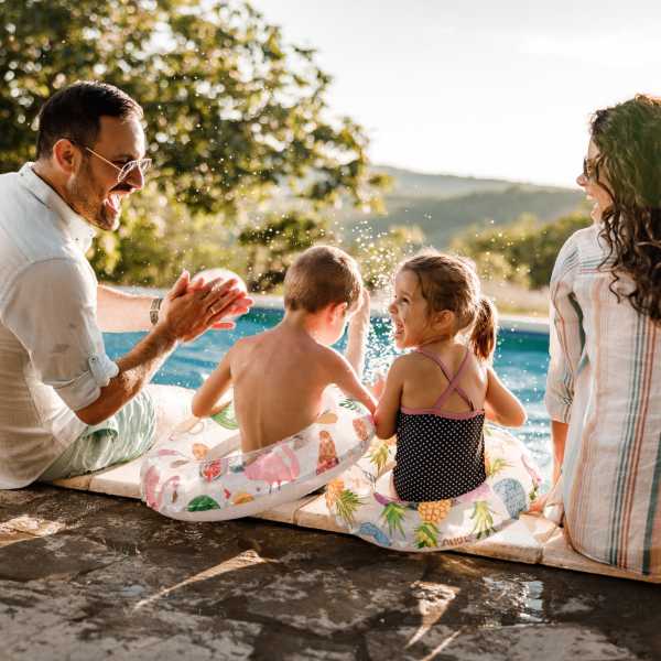 A family sits poolside at East Beach Marina, Norfolk, Virginia