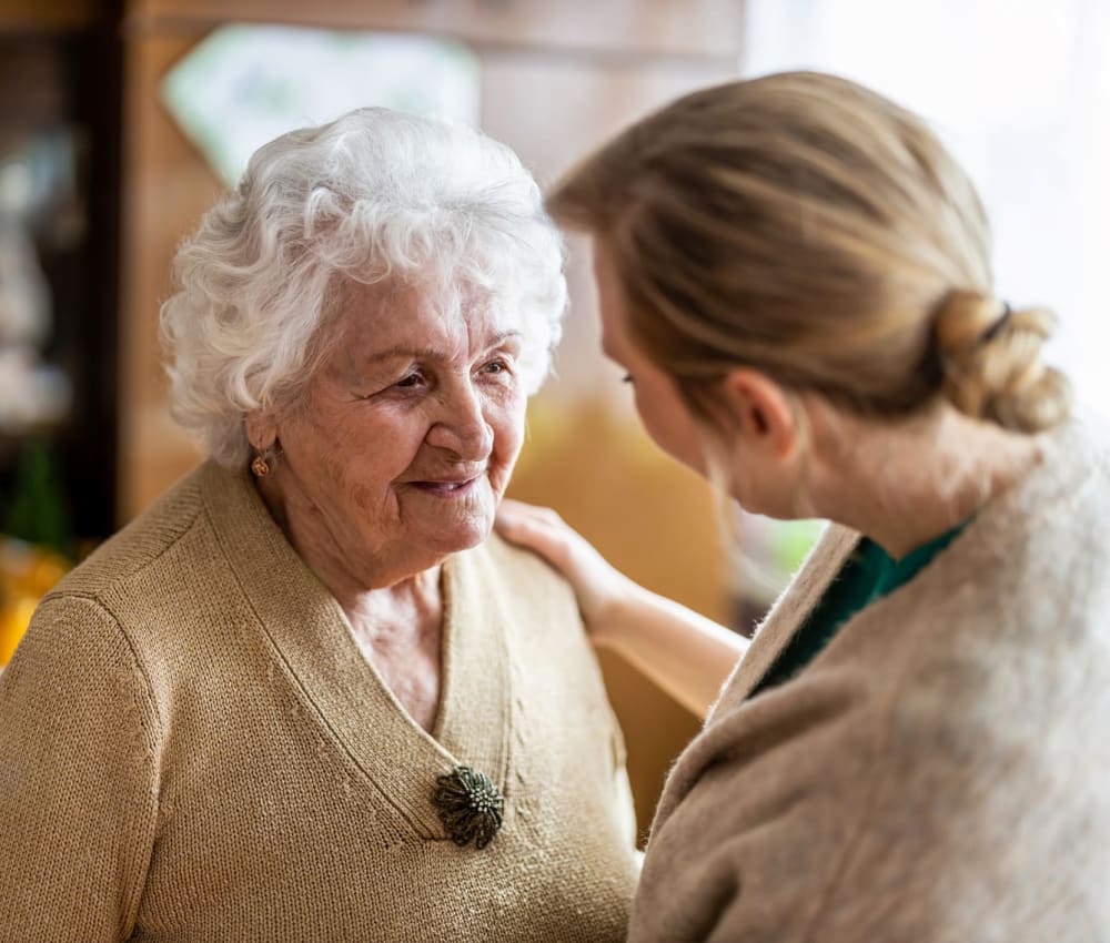 A resident recieves a friendly complement at The Village of Southampton in Houston, Texas