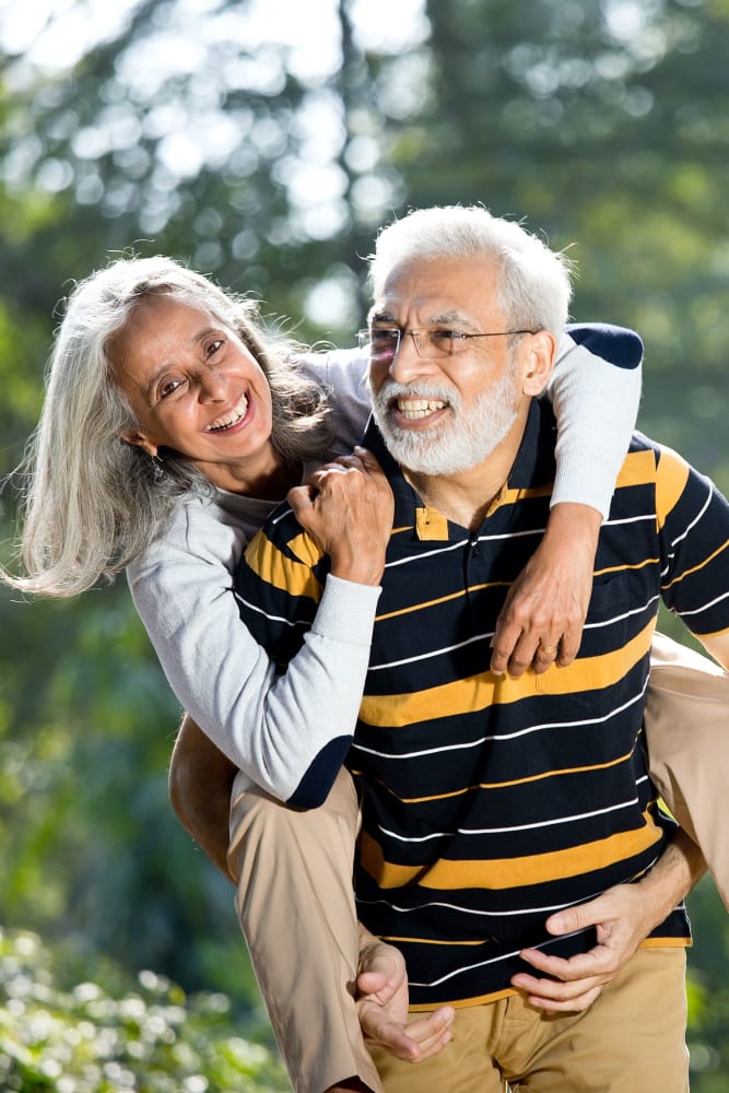 Older couple hiking near Admiralty Apartments in Port Townsend, Washington