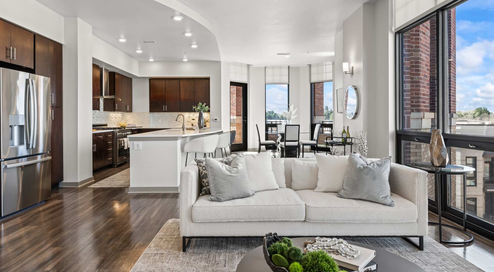 Penthouse apartment with floor to ceiling windows and a spacious layout at Kent Place Residences in Englewood, Colorado