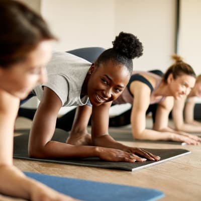 Residents enjoying a yoga class near Parkside Towns in Richardson, Texas