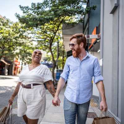 Residents walking to home with shopping bags in their hand near Quail Run in Middleton, Wisconsin