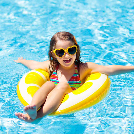 Kid enjoying the pool at Suncrest Apartments in Tumwater, Washington