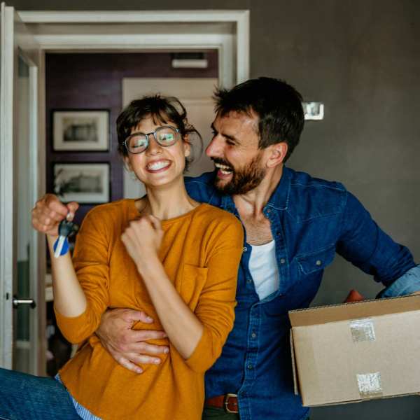 Happy couple at Tenants Development Corporation in Boston, Massachusetts