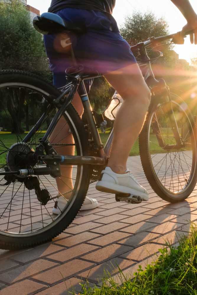 Resident cycling near near Sulzbacher Village in Jacksonville, Florida
