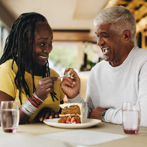 Couple having food at The Villas at Rowland Heights in Rowland Heights, California