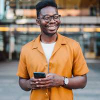 Resident walking in the downtown near Green|House Columbus in Columbus, Ohio