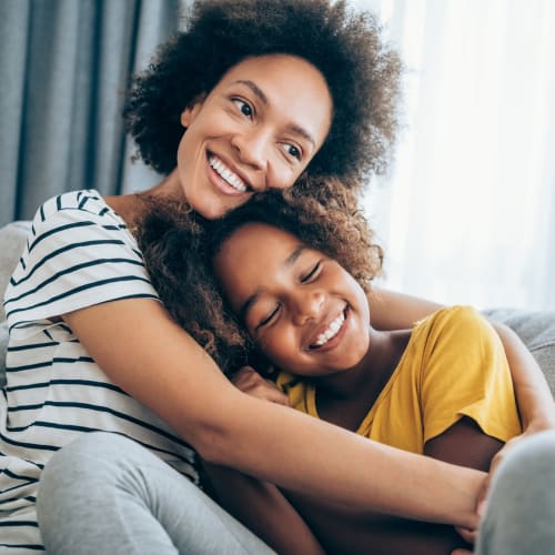 Woman hugging her daughter at Allegria at Roseville in Roseville, California