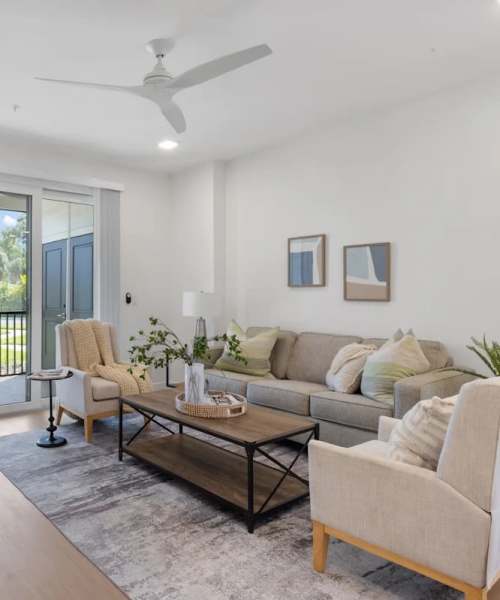 Beautiful living room at The Waterfront on Hatchett Creek in Venice, Florida