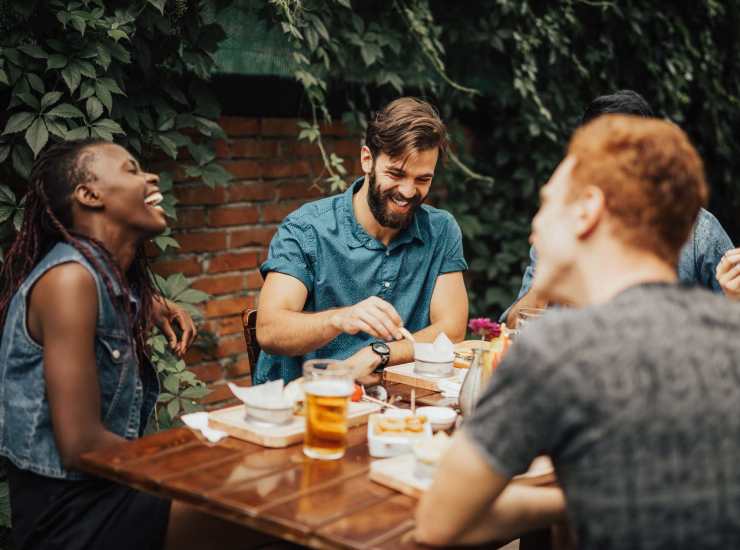 Residents enjoying food in a restaurant near Huntersville Commons in Huntersville, North Carolina
