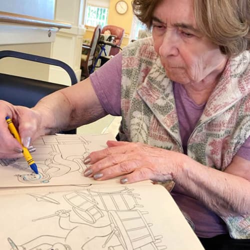 Resident coloring at Canoe Brook Assisted Living & Memory Care in Catoosa, Oklahoma