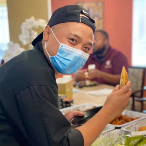 Masked chef at The Oxford Grand Assisted Living & Memory Care in McKinney, Texas