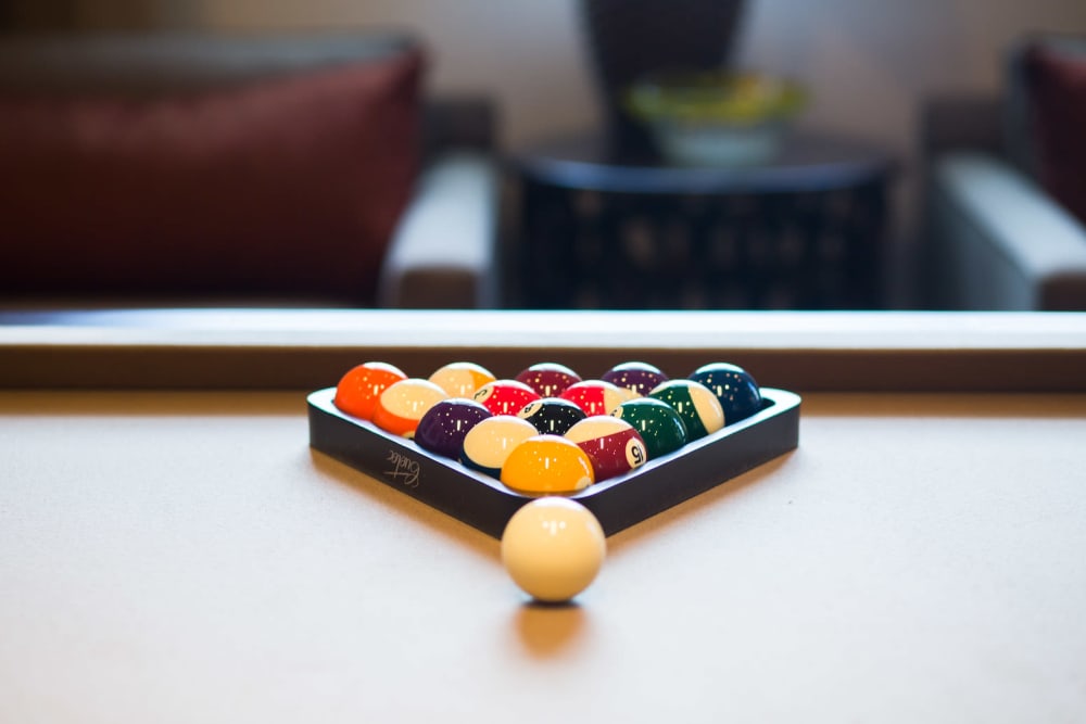 Balls racked and ready to go on the billiards table in the clubhouse at Auro Crossing in Austin, Texas