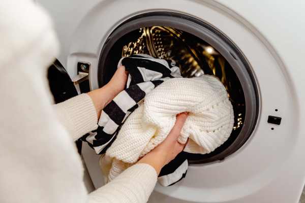 Resident doing laundry at Glenridge Gardens in Augusta, Maine