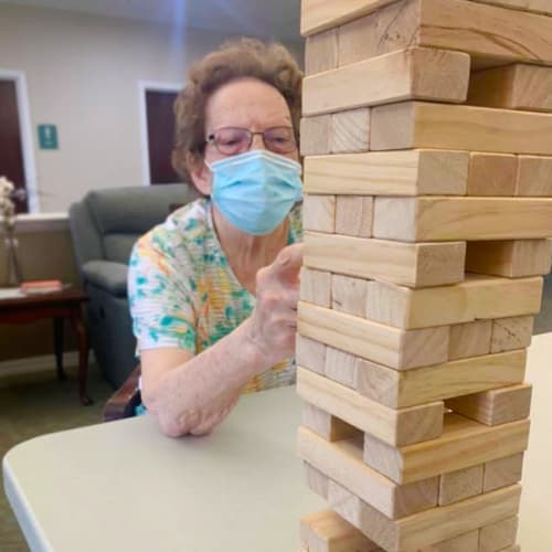 Resident enjoying a game at Madison House in Norfolk, Nebraska