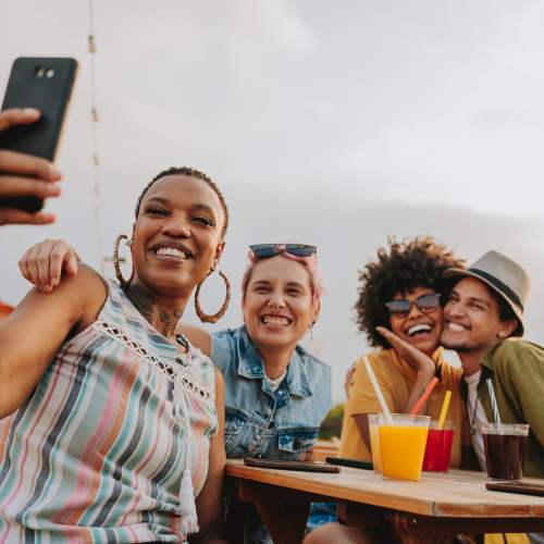 Friends taking a selfie near Citrus Run Apartments in Tampa, Florida