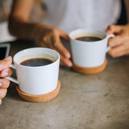 Residents having coffee near Adagio at Westshore Palms in Tampa, Florida