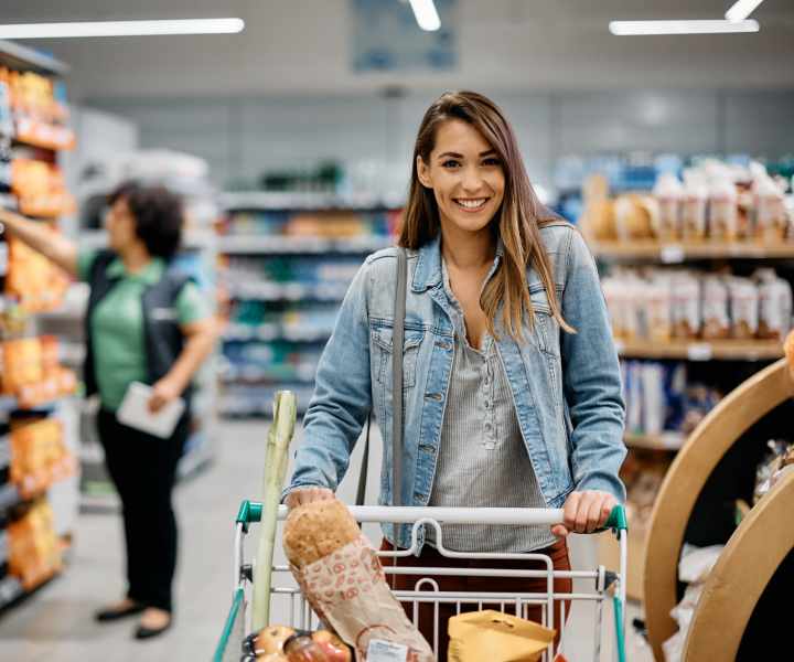Resident shopping in supermarket near El Cid Apartments in West Palm Beach, Florida