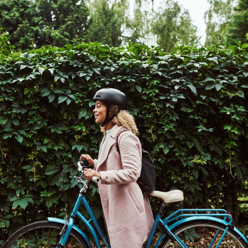Woman with her bike at Chatham Village in Tustin, California