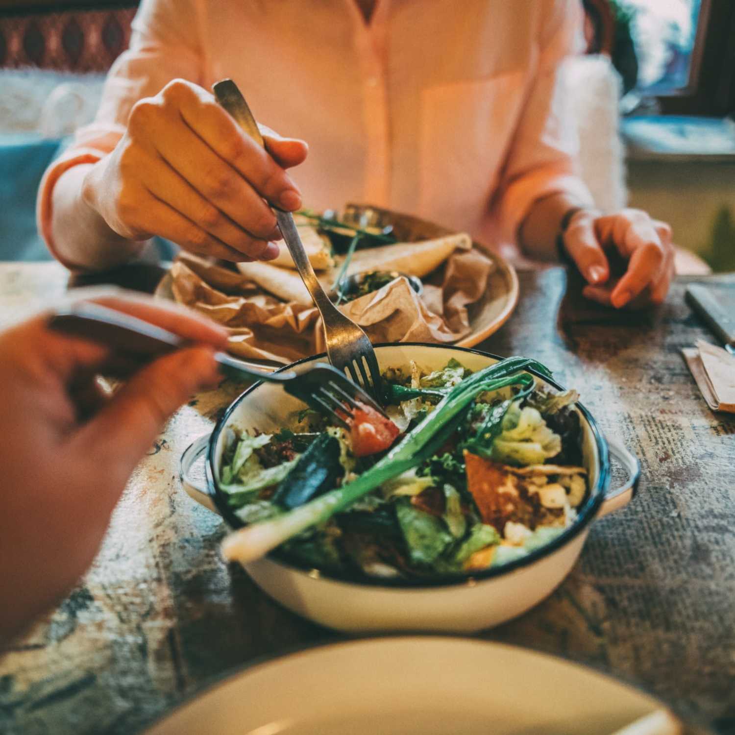 Resident couple enjoying a meal together at a restaurant near Beverly Villas in Brunswick, Georgia