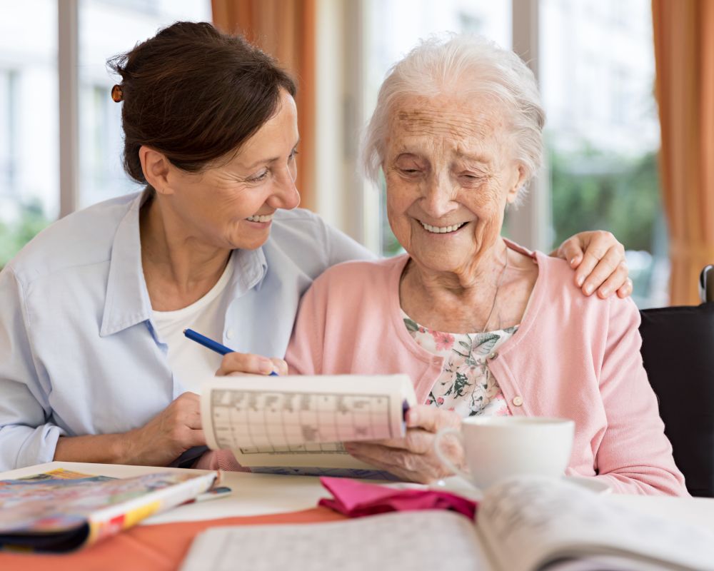 Nurse assisting senior at Seven Lakes Memory Care in Loveland, Colorado