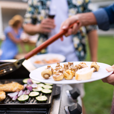 Residents grilling food during a community event at Capeharts in Ridgecrest, California