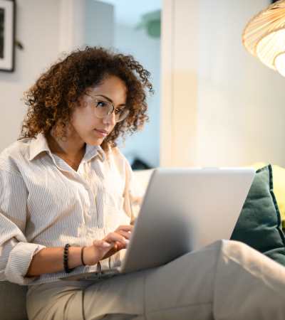 Women working on her laptop at Reno Experience District in Reno, Nevada