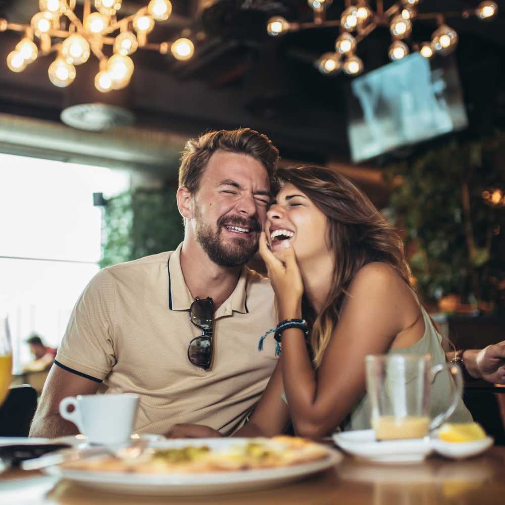 residents couple having lunch at a restaurant near Willow Creek Crossing in Hillsboro, Oregon