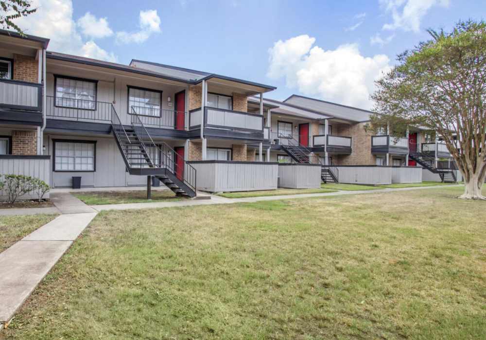 View of the park in front of the building at Rayfords Edge Apartments in Spring, Texas