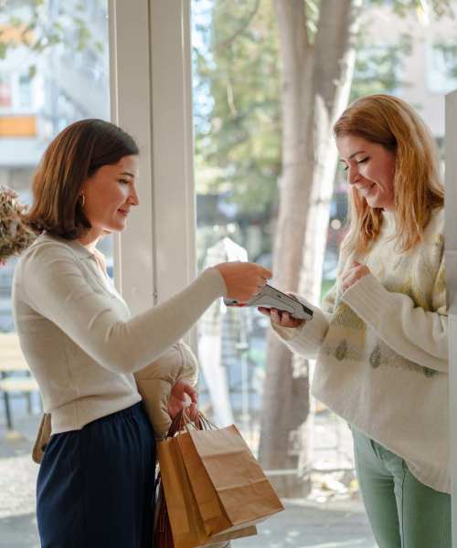 Woman making a purchase at a store near Landmark at Dublin in Dublin, Pennsylvania