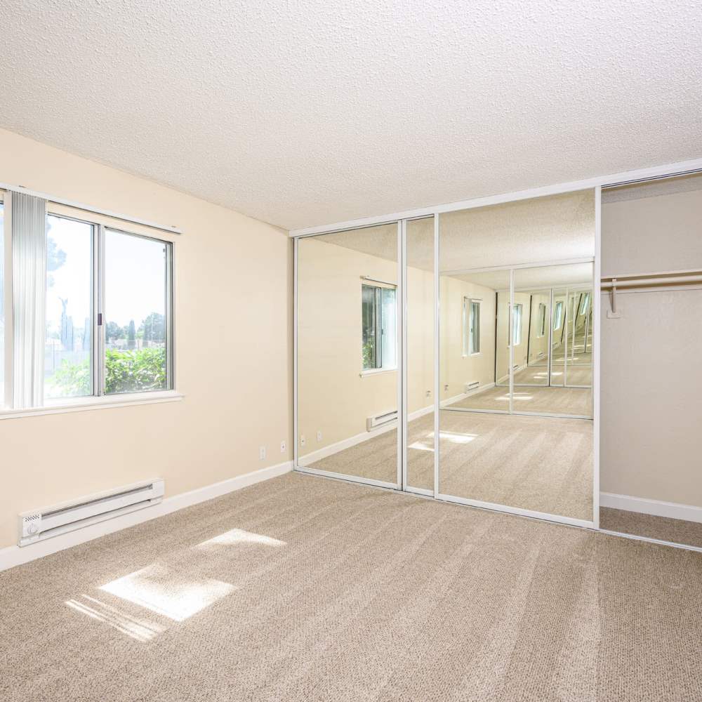 Open floor plan with large glass doors for access at Vista in San Jose, California