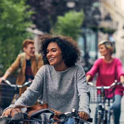 A resident with friends rides her bike near Sugar Flats, Salt Lake City, Utah