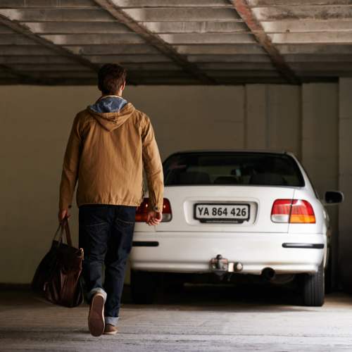 Man walking in parking garage at Zacharys Crossing in Washington Court House, Ohio
