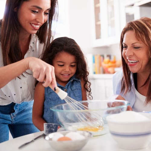 Residents baking in a home at Perry Circle Apartments in Annapolis, Maryland