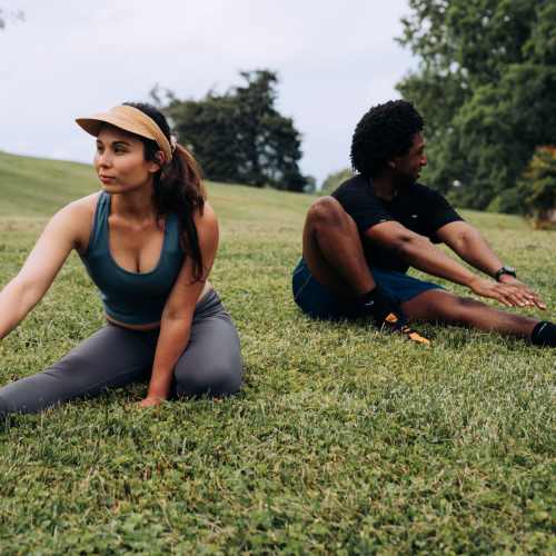 A resident couple in a park near The Maximillian at Stonefield in Charlottesville, Virginia