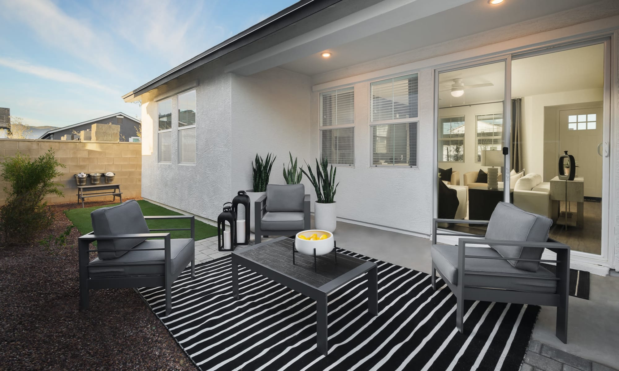 Backyard with sliding door at Cyrene at Estrella in Goodyear, Arizona