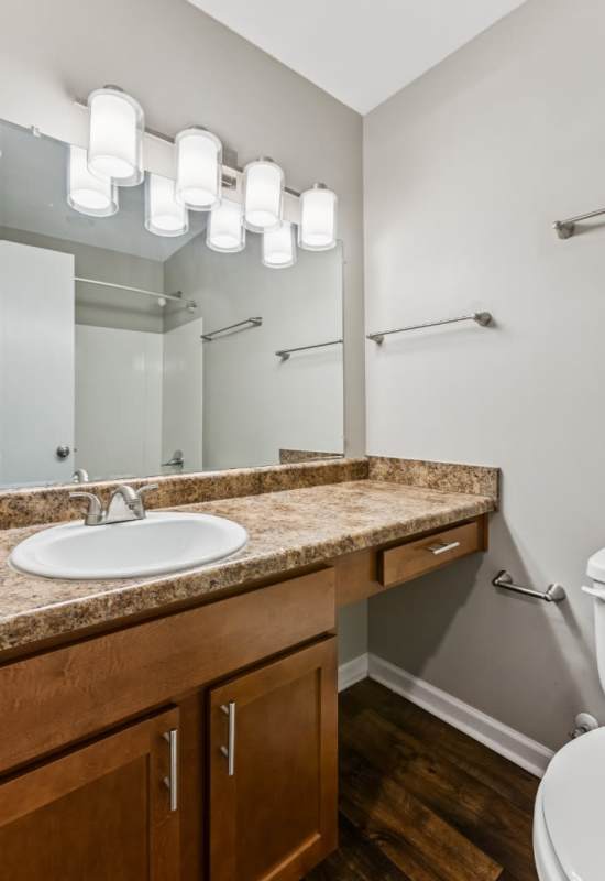 Brightly lit resident bathroom at Ashford Place in Clarksville, Tennessee