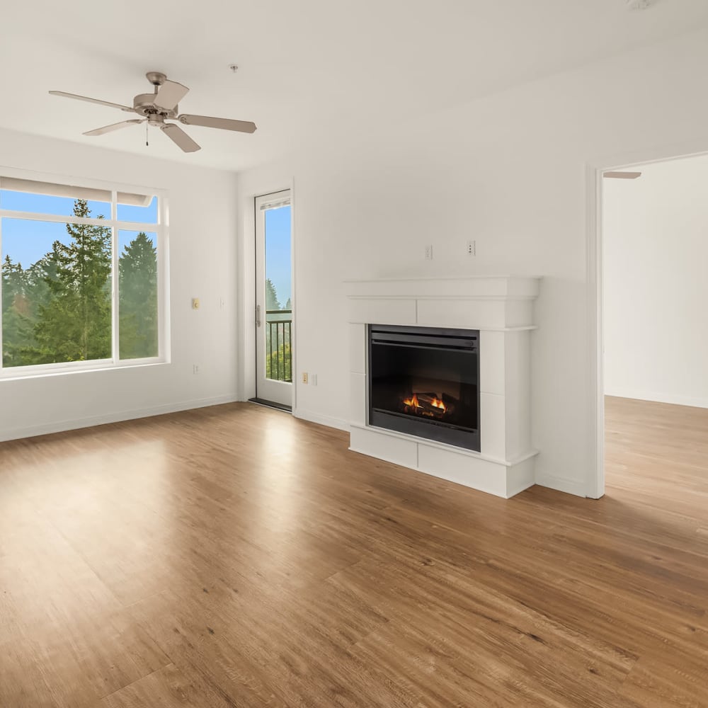 Open floor plan with fireplace at Chateau Woods in Woodinville, Washington