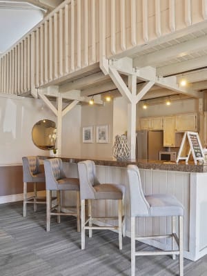 Elegant clubhouse seating with fireplace at Polo Run Apartments in Tulsa, Oklahoma