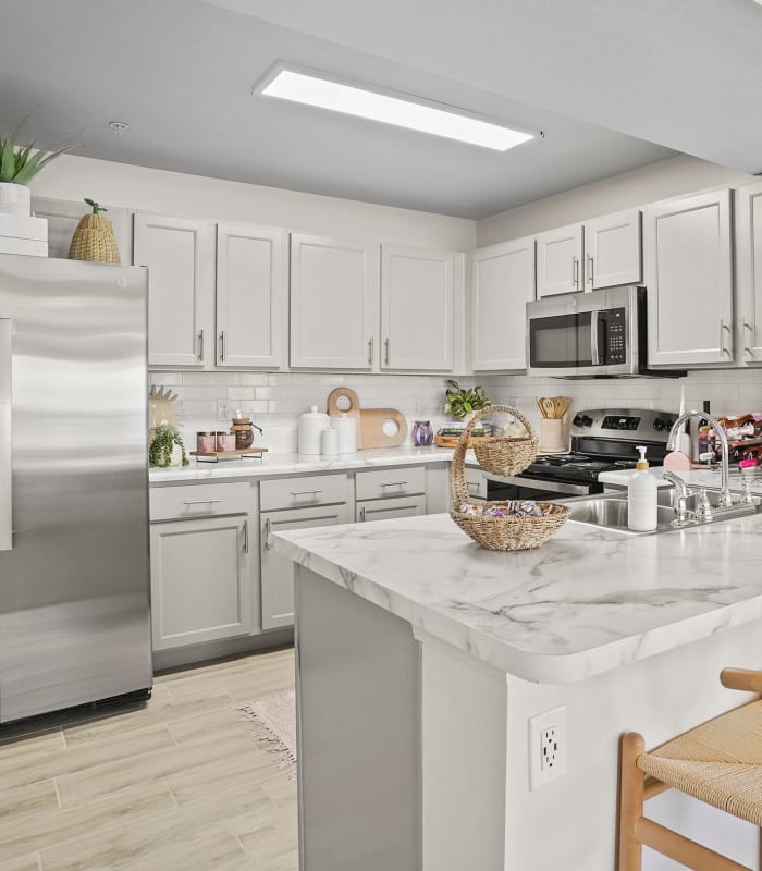 Kitchen area at Center 301 Apartments in Belton, Missouri