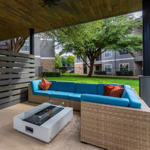 Covered, outdoor seating at Park Creek Apartments in Fort Worth, Texas