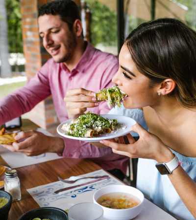 Resident couple eating lunch at a favorite restaurant near Citrus Run Apartments in Tampa, Florida