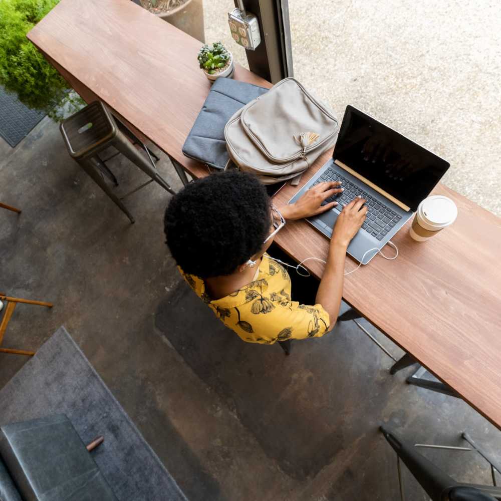 Resident working on their laptop near Bana At Tujunga in Tujunga, California